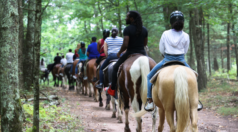 group of people horse back riding in the Poconos